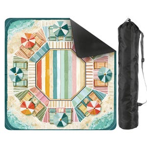 May include: A beach-themed picnic blanket with a colorful design featuring beach umbrellas, lounge chairs, and a central striped pattern. The blanket is rolled up in a black carrying bag with a shoulder strap, perfect for outdoor use.