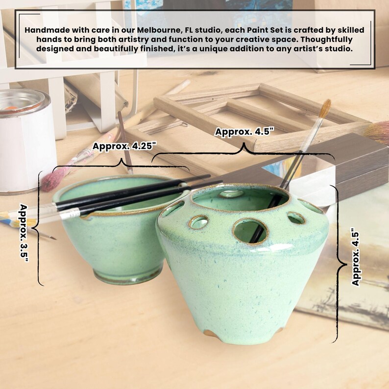 May include: A set of two ceramic paint brush holders. The larger holder is 4.5 inches tall and has six holes for brushes. The smaller holder is 4.25 inches wide and 3.5 inches tall. Both holders are a light green color with a speckled glaze.