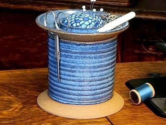 Homemade big thread spool holder/feeder : r/quilting