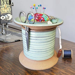 Green Sewing Station Caddy – Ceramic Spool Organizer with Pincushion Rainbow Cat