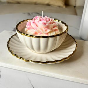 Candle in teacup with floral scent
