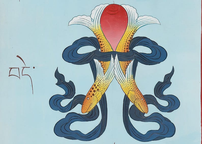 May include: A vibrant illustration featuring two fish with yellow and orange scales, linked by a red and white floral design. Dark blue ribbons weave around the fish against a light blue backdrop. Tibetan script is visible on the left.