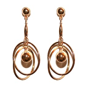 May include: A pair of gold-colored earrings. Each earring features a small round stud, a long, slender connecting piece, two interlocking oval hoops, and a dangling sphere. The earrings are displayed against a white background.