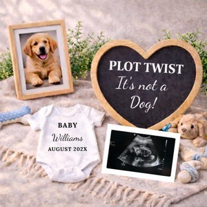 May include: An announcement featuring a framed photo of a golden retriever puppy, a heart-shaped chalkboard with the text "PLOT TWIST It's not a Dog!", a white baby onesie with the text "BABY Williams AUGUST 202X", and an ultrasound scan.