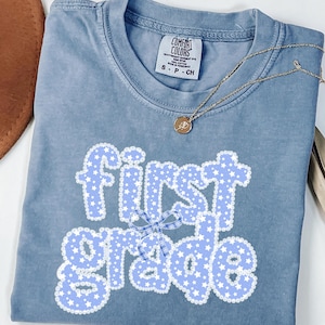 Comfort Colors First Grade Teacher Shirt: Back to School Tee with Coquette Bow