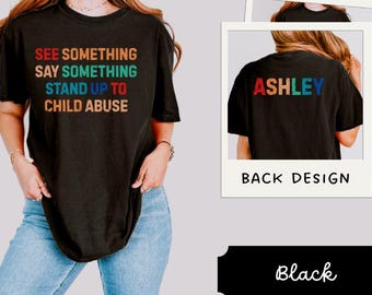 Stand Up To Child Abuse Awareness Shirt, Retro Multicolor Text, Ashley Back Print Tee