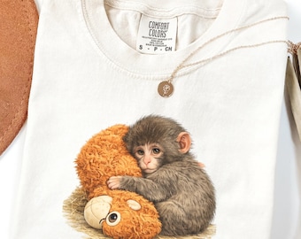 Apa Punch Grafisk t-shirt, Apaunge som håller plyschleksak, Djurälskare Gåva, Söt Mysig T-shirt
