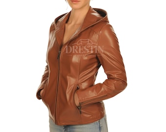 May include: A brown leather jacket with a hood and a zipper closure. The jacket has two front pockets and the text "DRESTIN FASHION" is visible on the chest area. The jacket is worn by a person.
