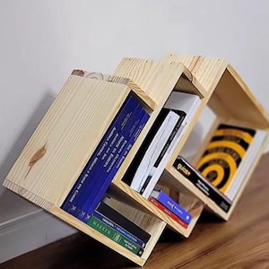 Handcrafted wooden zigzag bookshelf with geometric cube design, modern floor standing book rack for home office or reading corner