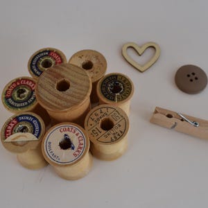 May include: A set of three ceramic mugs with a speckled, matte finish. The mugs are in shades of cream, light gray, and dark gray. Each mug has a simple, minimalist design, perfect for coffee or tea.