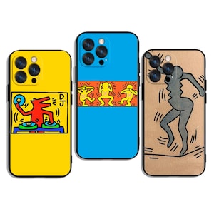 May include: Three phone cases with vibrant designs. A yellow case displays a red DJ graphic. A blue case features yellow dancing figures. The third case is tan with a grey figure.