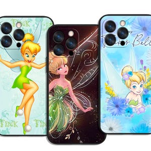 May include: Three phone cases featuring Tinkerbell designs. One case has a light blue background with Tinkerbell in a green dress. Another case has a dark background with a fairy in a green dress. The third case has a light blue background with Tinkerbell and the words "Tinker Bell".