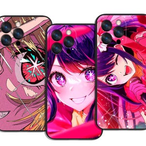 May include: Three phone cases with anime-style illustrations. The cases feature vibrant colours, including pink, purple, and red. Each case has a different design, showcasing anime characters with large eyes and detailed features. The cases have a black border.