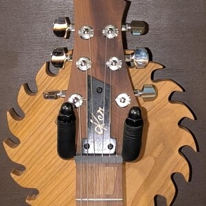 Guitar wall mount in circular saw design BL