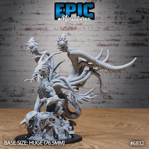 May include: A grey unpainted resin miniature of a multi-tentacled creature with a central head, multiple eyes, and clawed limbs, standing on a textured base with mushroom-like growths. The base is labelled as a huge 76.5mm size for this gaming figure.