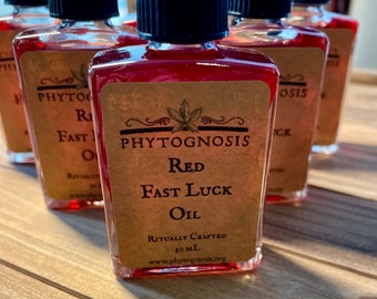 Red Fast Luck Oil - A Conjure oil for dressing candles, bills, and bags!