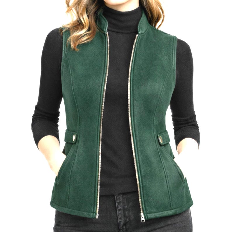 Women wearing forest green leather vest with open zipper, tailored slim fit over black turtleneck, elegant studio e-commerce photo for Etsy, Anabia Leather Co.