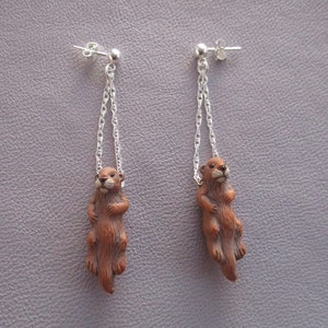 Otter earrings- brown ceramic otters on sterling silver chain swinging from posts