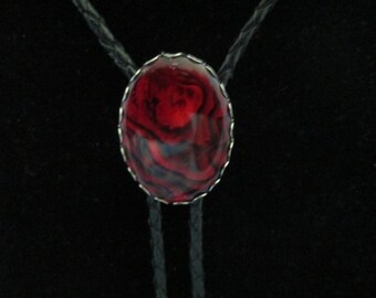 Red paua shell bolo tie- black leather cord