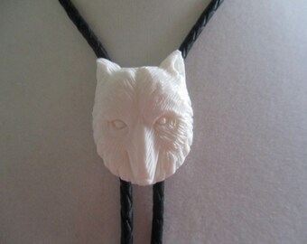 Wolf bolo tie- carved bone- black leather cord