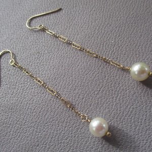 14k solid yellow gold earrings- genuine pearls- June birthstone- 1.75 inches long
