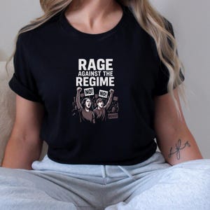 Rage Against the Regime Shirt – Protest Graphic Tee, Activist March Design, No! Rally Illustration, Political Streetwear Gildan 64000 Unisex
