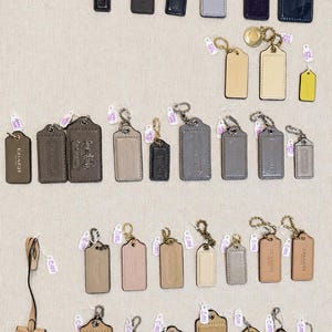 Individual Vintage Coach Tags and Charms Listing 2 of 2. Assorted