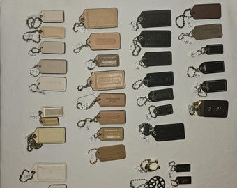 Individual Vintage Coach tags and Charms listing 1 of 2. Assorted sizes and colors.  Please see other listing in our shop for other colors.