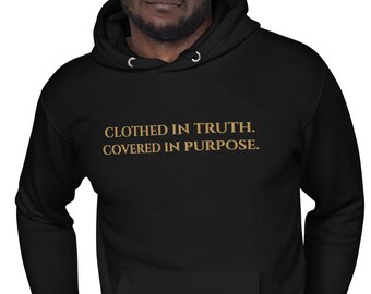 May include: Black hooded sweatshirt with the text "CLOTHED IN TRUTH. COVERED IN PURPOSE." in gold lettering. The hoodie has a drawstring and a front pocket.