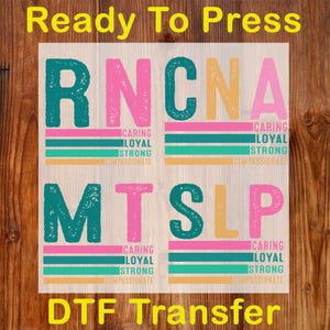 May include: A DTF transfer design with the words "Ready To Press" at the top and "DTF Transfer" at the bottom. The design features the letters RNCNA and MTSLP in teal, pink, and yellow, with the words "Caring, Loyal, Strong, Compassionate".