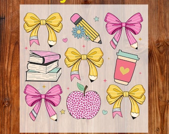May include: A DTF transfer sheet with school-themed graphics. The design includes yellow bows with pencil accents, pink bows, a stack of books, a pencil with a flower, a pink apple with a leopard print, and a coffee cup. The text "Ready To Press" and "DTF Transfer" are displayed.