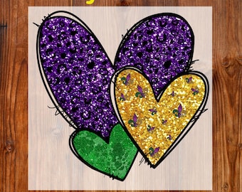 May include: DTF transfer featuring three heart shapes. Two purple hearts with leopard print and a gold heart with fleur-de-lis symbols. A green heart is also present. The words "Ready To Press" and "DTF Transfer" are in yellow.