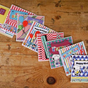 Cartões de aniversário e comemorativos do Snoopy feitos à mão