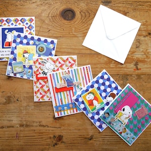 Tarjetas navideñas y de la nueva casa de Snoopy hechas a mano