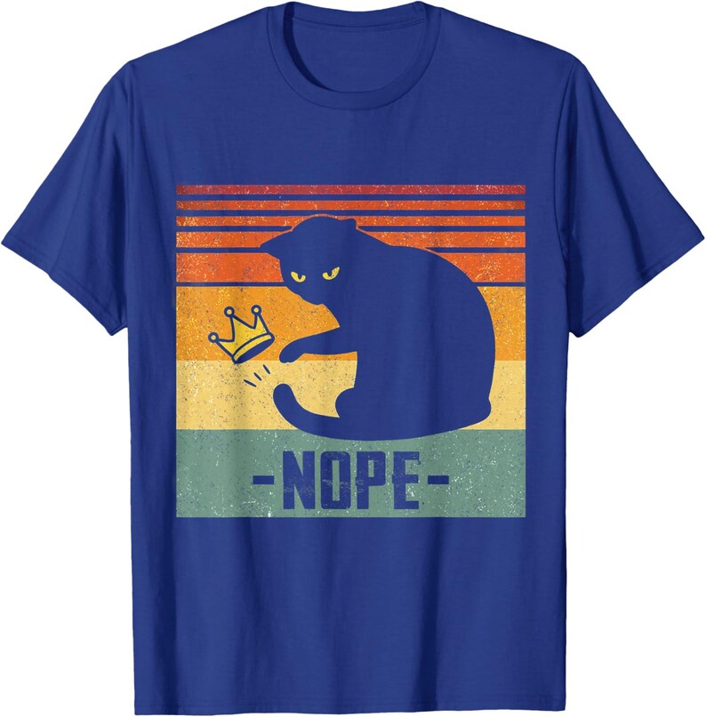 May include: Blue t-shirt with a black cat silhouette, yellow eyes, and a gold crown. The cat is above the word "-NOPE-" in white. The background has orange, yellow, and green horizontal stripes. A humorous cat-themed design.
