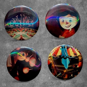 May include: Four circular pin-back buttons featuring colorful illustrations from the movie Coraline. The designs include the Coraline title logo, a portrait of Coraline, a character with cotton candy, and a blue-skinned character in a uniform.