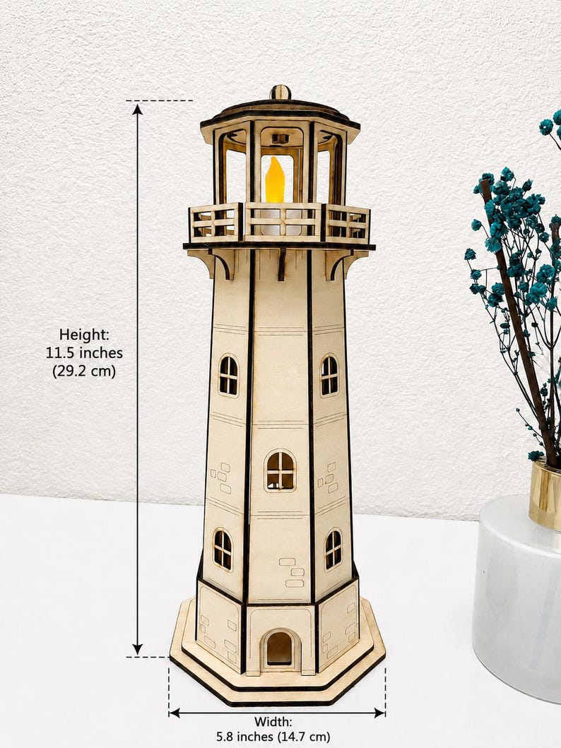 May include: A laser-cut wooden lighthouse model with a yellow LED light at the top. The structure features multiple windows and a balcony. It measures 11.5 inches in height and 5.8 inches in width, as indicated by the text labels on the image.