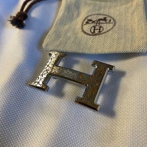 Boucle de ceinture Hermes H élégante et authentique en argent