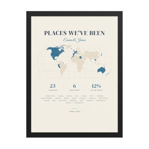 Real product photo: the Custom Places We've Been Map Print in the black wood frame with a clear acrylic front