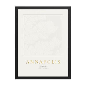 Real product photo: the Custom Embossed Look City Map Print in the black wood frame with a clear acrylic front