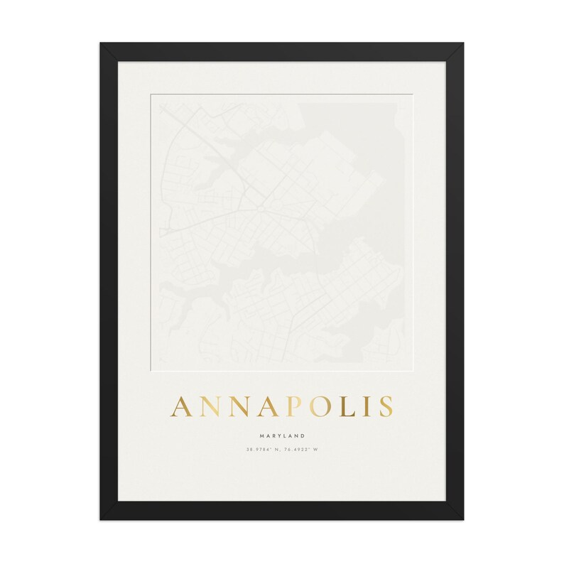 Real product photo: the Custom Embossed Look City Map Print in the black wood frame with a clear acrylic front