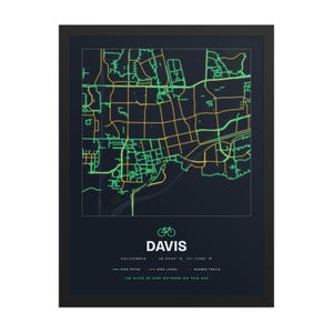 Real product photo: the Custom Bike Map Print in the black wood frame with a clear acrylic front