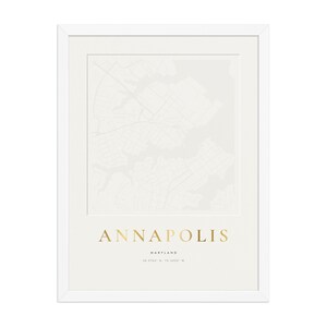 Real product photo: the Custom Embossed Look City Map Print in the white wood frame with a clear acrylic front