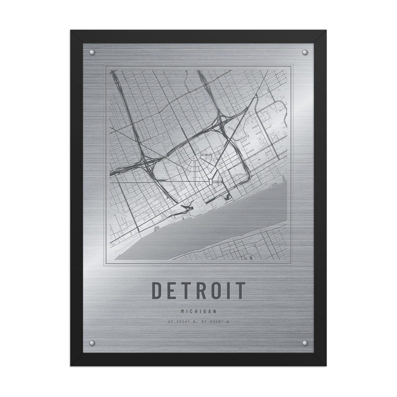 Real product photo: the Custom Etched Metal Look City Map Print in the black wood frame with a clear acrylic front