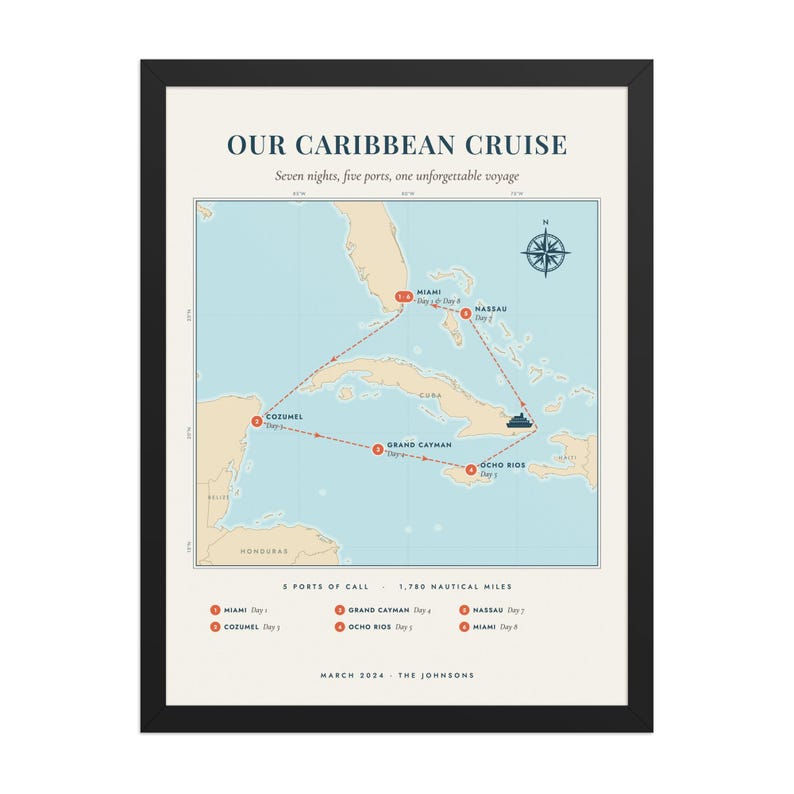 Real product photo: the Custom Cruise Map Print in the black wood frame with a clear acrylic front