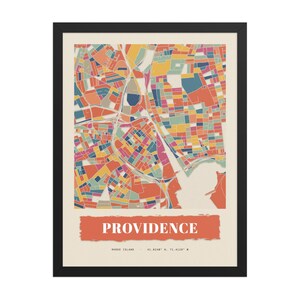 Real product photo: the Custom Paper Collage City Map Print in the black wood frame with a clear acrylic front