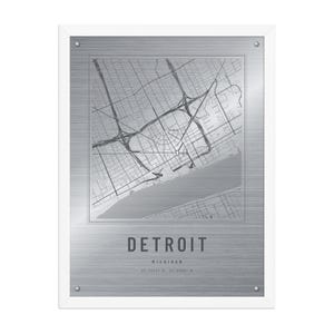 Real product photo: the Custom Etched Metal Look City Map Print in the white wood frame with a clear acrylic front
