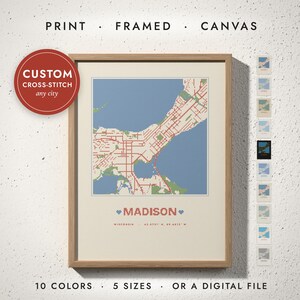 Cross-Stitch City Map print in a natural oak frame on a white wall — print, framed, canvas or digital file, 10 colors, 5 sizes