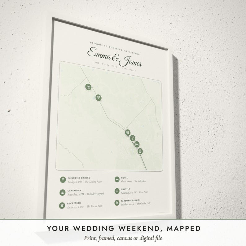 Three-quarter view of the framed Wedding Weekend Map poster on a white plaster wall