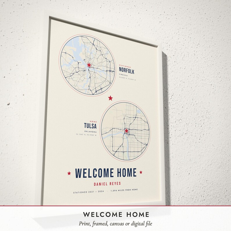 Three-quarter view of the framed Military Homecoming Map poster on a white plaster wall